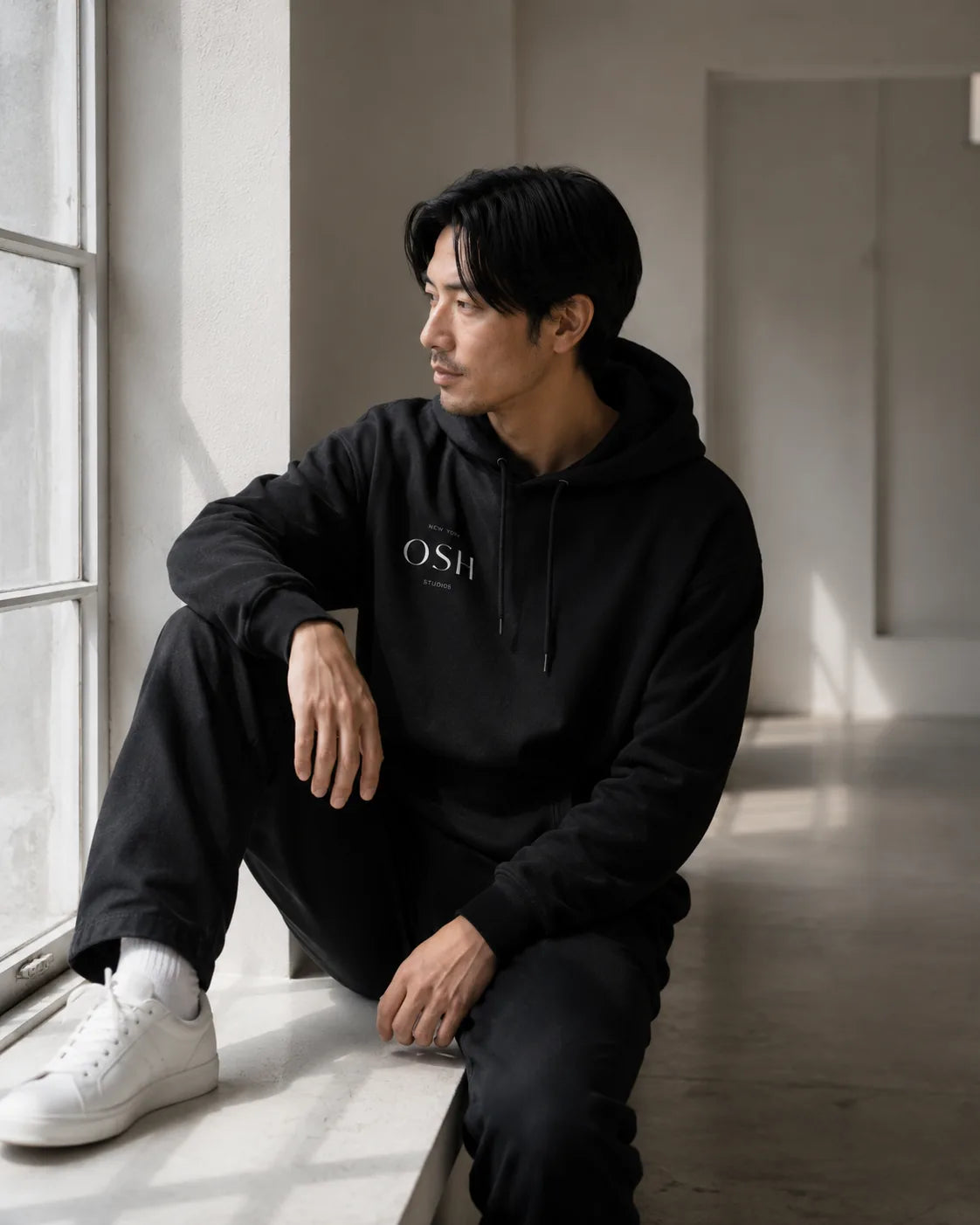 Drop-shoulder fleece hoodie — worn